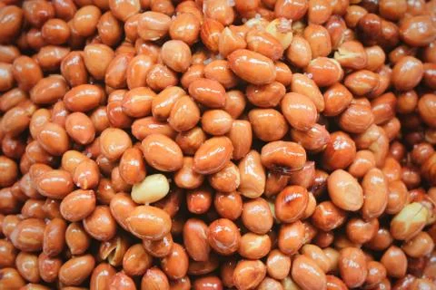 Ried and Salted Peanuts or Groundnut Background Stock Photos