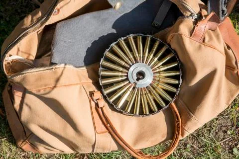 Rifle Ammunition in Round Case on Old Tote Bag Foto stock