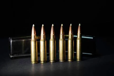 Rifle Bullets with Clips Stock Photos