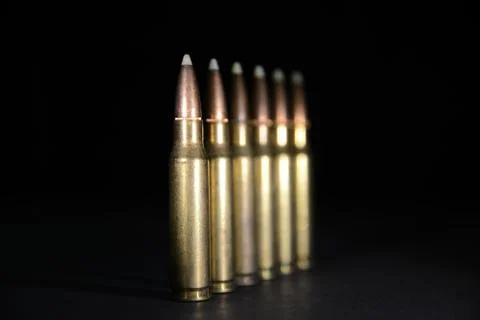 Rifle Bullets Row 1 Stock Photos