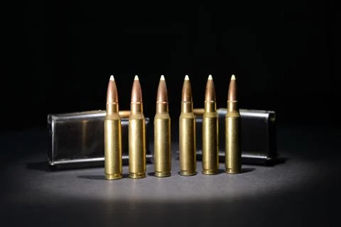 Rifle Bullets Spotlight Stock Photos
