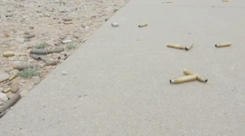 Rifle Shell Casings on the Ground Stock Footage 60665705