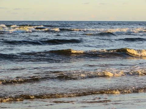Riga bay in the rays of the setting sun. Stock Photos
