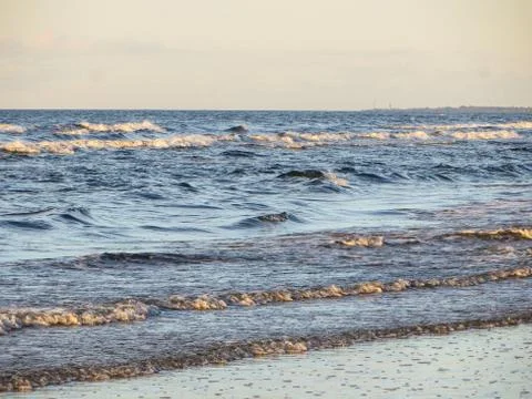 Riga bay in the rays of the setting sun. Stock Photos