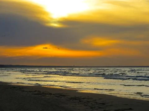 Riga bay in the rays of the setting sun. Stock Photos