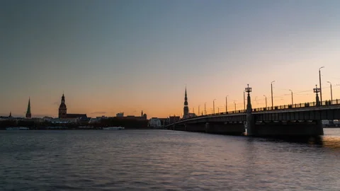 Riga bridge over river Daugava old town view sunrise timelapse Stock Footage 257797294
