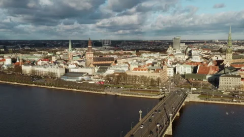 Riga Castle and Old Town Skyline with Stone Bridge over Daugava River Stock Footage 325975096