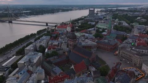 Riga Cathedral, Dome square and houses in old town. Aerial shot of historic Stock Footage 250199089