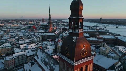 Riga Cathedral Winter Sunset - Frozen Daugava and Historic Latvia City Skyline Stock Footage 346093971