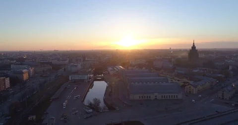 Riga city and evening time Old town Riga Drone flight over Roads and Market Stock-Footage 84230945