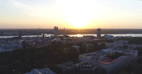 Riga city and evening time sunset Old town Riga Drone flight over Roads and Stock Footage 84263430