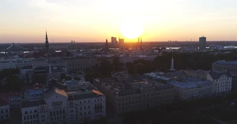 Riga city and evening time sunset Old town Riga Drone flight over Roads and Video stock 84265165