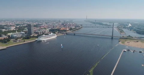 Riga city cable-stayed bridge Dugava river and il city Drone Flight yacht ferry Stock Footage 87805087