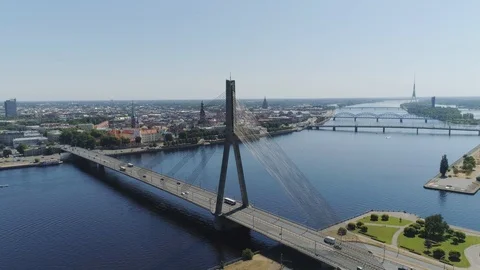Riga city cable-stayed over bridge Dugava river and city Drone summer Flight Stock Footage 91279927