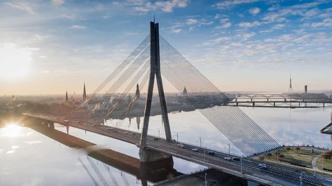 Riga city Timelapse cable-stayed bridge Dugava river and il city Drone Flight Stock Footage 87907332