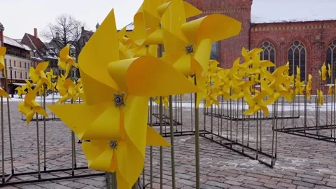 Riga Dome square with Yellow wind spinners Stock-Footage 237082639