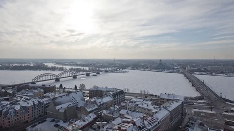Riga Down Town Cathedral Dome Daugava river and bridges timelapse, winter time Stock Footage 82953340