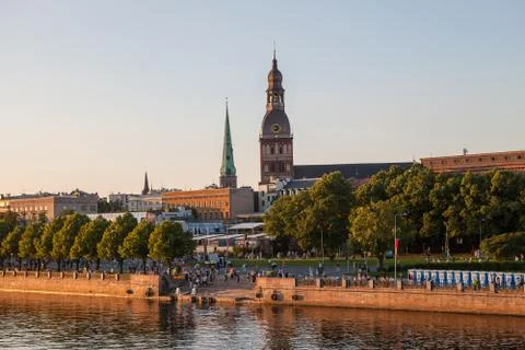 RIGA, LATVIA - 12 JUN 2016: Old town, summer sunset skyline with Daugava river Stock Photos