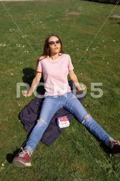 RIGA, LATVIA - APRIL 28, 2019: Successful business woman eating McDonalds Big Stock Photos