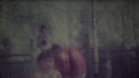 RIGA, LATVIA - JULY, 1986: Children are playing at playground Stock Footage