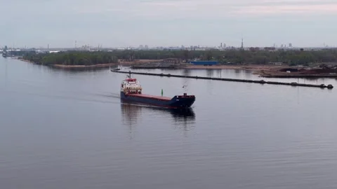 Riga, Latvia - May 3, 2026: Cargo Ship Departing Riga Harbor Stock Footage 334062834