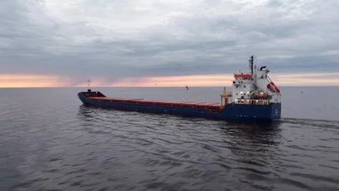 Riga, Latvia - May 3, 2026: Cargo Ship Departing Riga Harbor Stock Footage 334062959