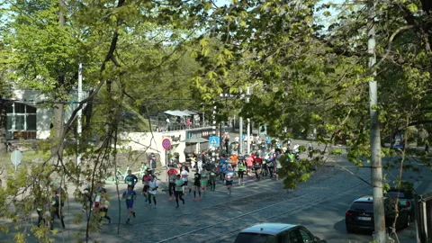 Riga Marathon 2023, runners run near Jekaba Kazarmas Stock Footage 240538882
