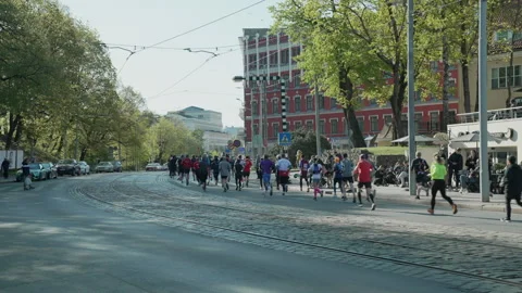 Riga Marathon 2023, runners on Zigfrida Annas Meirovica blv. Stock Footage 240538813