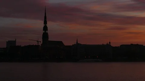 Riga Old Town Skyline seen over river Daugava at sunrise Stock Footage 97111645