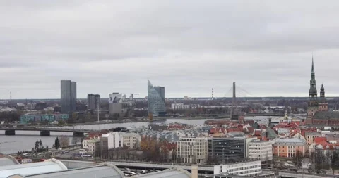 Riga old town skyline with St. Peter’s spire and Vansu Bridge. Stock Footage 320169875