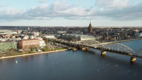 Riga Railway Bridge with train Central Market and Academy of Sciences Stock Footage 325975019