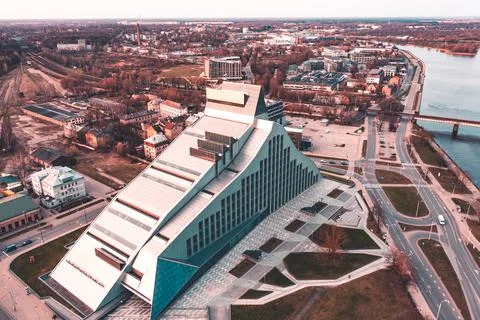 RIga rooftop view panorama at sunset with urban architectures and Daugava Riv Stockfoto's