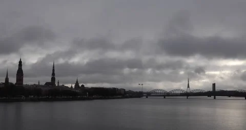 Riga skyline and arched bridge under brooding storm clouds. Stock Footage 320170177