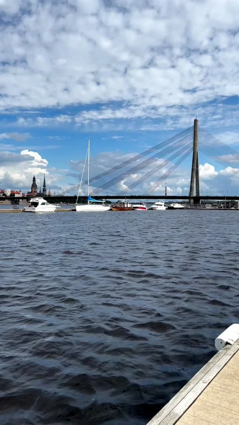 Riga Waterfront with Vansu Cable-Stayed Bridge and Marina Boats Stock Footage 343136781