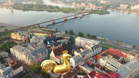 Riga,Latvia.Aerial 4K video from drone to St. Peter's Basilica tower golden cock Stock Footage 147851253