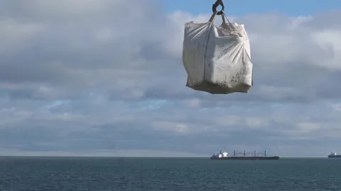 Rigging operations with crane against calm sea on tanker Stock Footage 130994936