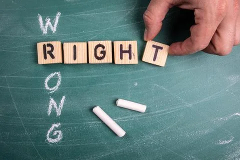 RIGHT and WRONG concept. Text from the letters of the wooden alphabet Stock Photos