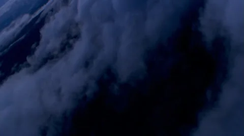Right-angle flight into dark cumulus wall Stock Footage 59452630