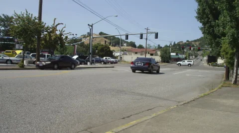 Right Front Three Quarter view of a Driving Plate: Car travels the length of SE Stock Footage 59272586
