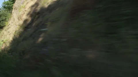 Right Front Three Quarter view of a Driving Plate: Car traveling east on Stock Footage 59298871