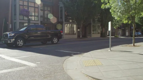 Right Front Three Quarter view of a Driving Plate: Car traveling on NW Johnson Stock Footage 59301963