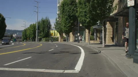 Right Front Three Quarter view of a Driving Plate: Car turns right from MLK Stock Footage 59306774