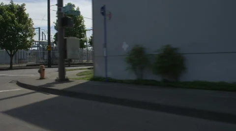 Right Front Three Quarter view of a Driving Plate; Car travels on NW Front Stock Footage 59311432