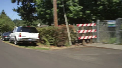 Right Front Three Quarter view of a Driving Plate: Car turns left from SW Stock Footage 59324534