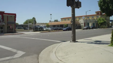 Right Front Three Quarter view of a Driving Plate: Car turns right from North Stock Footage 59331900