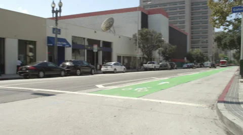 Right Front Three Quarter view of a Driving Plate: Car turns right from West 2nd Stock Footage 59337337