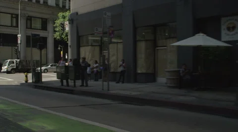 Right Front Three Quarter view of a Driving Plate: Car travels one block on Stock Footage 59337964