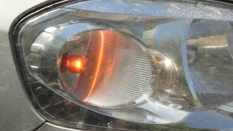 The right front turn signal flashes in the car. Stock Footage 134120946