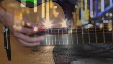 Right-hand appearing plucking strumming guitar strings syncing candlesticks Stock Footage 320287275