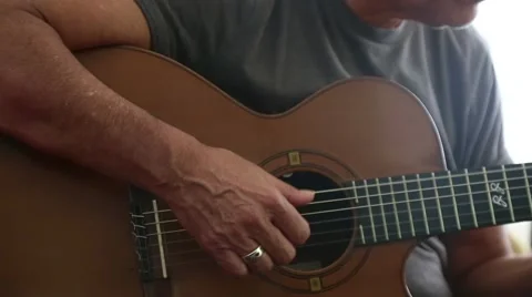 Right hand of a classical guitar player Stock Footage 65221526